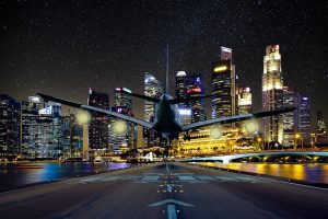 Plane taking off above a city
